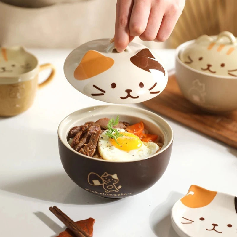 A hand lifts the cat-shaped lid from the Cute Cartoon Cat Soup Bowl by KittyNook Cat Co., revealing a delicious meal.