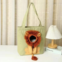 Thumbnail for KittyNook Cat Co. Lion Design Soft Cat Carrier Bag with plush face, on a table—perfect for your pet’s travel needs.
