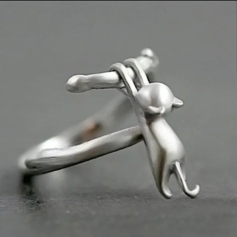 KittyNook Cat Co. Sterling Silver Cat Branch Ring features a playful cat and an adjustable, comfortable fit.
