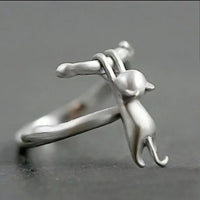 Thumbnail for KittyNook Cat Co. Sterling Silver Cat Branch Ring features a playful cat and an adjustable, comfortable fit.
