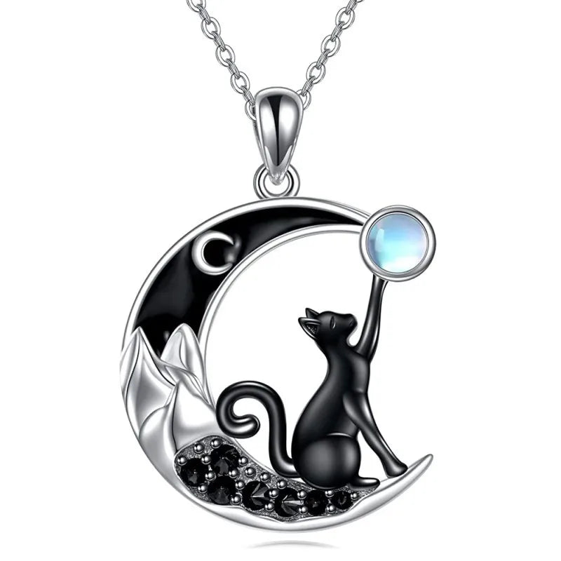 The Cute Black Kitty Moon Necklace by KittyNook Cat Co.—a unique cat lover gift with mountain and glowing orb details.