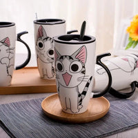 Thumbnail for KittyNook Cat Co. Large 600ml Funny Kitty Gift Mug: White with cartoon cat faces, black handle & lid—great cat lover gift!.