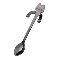 Thumbnail for The KittyNook Cat Co. Cat Cling Stainless Steel Mug Spoon has a cat-shaped handle with engraved face and raised arms.