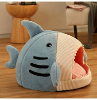Thumbnail for KittyNook Cat Co. Shark-Shaped Cat Cave Bed with pink cushion—cozy hideaway for your pet on the floor.
