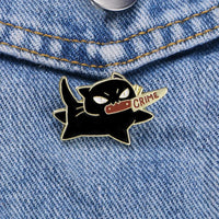 Thumbnail for The KittyNook Cat Co. Cute Black Cat Enamel Brooch shows a cat holding a 