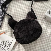 Thumbnail for The KittyNook Cat Co. Neko Soft Cat Shoulder Bag, small and black with cat ears, sits on a checkered surface.