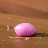 Thumbnail for The Creative Cat Doll Car Ornament by KittyNook Cat Co. is a pink, oval resin figurine (0.7cm x 1.3cm).