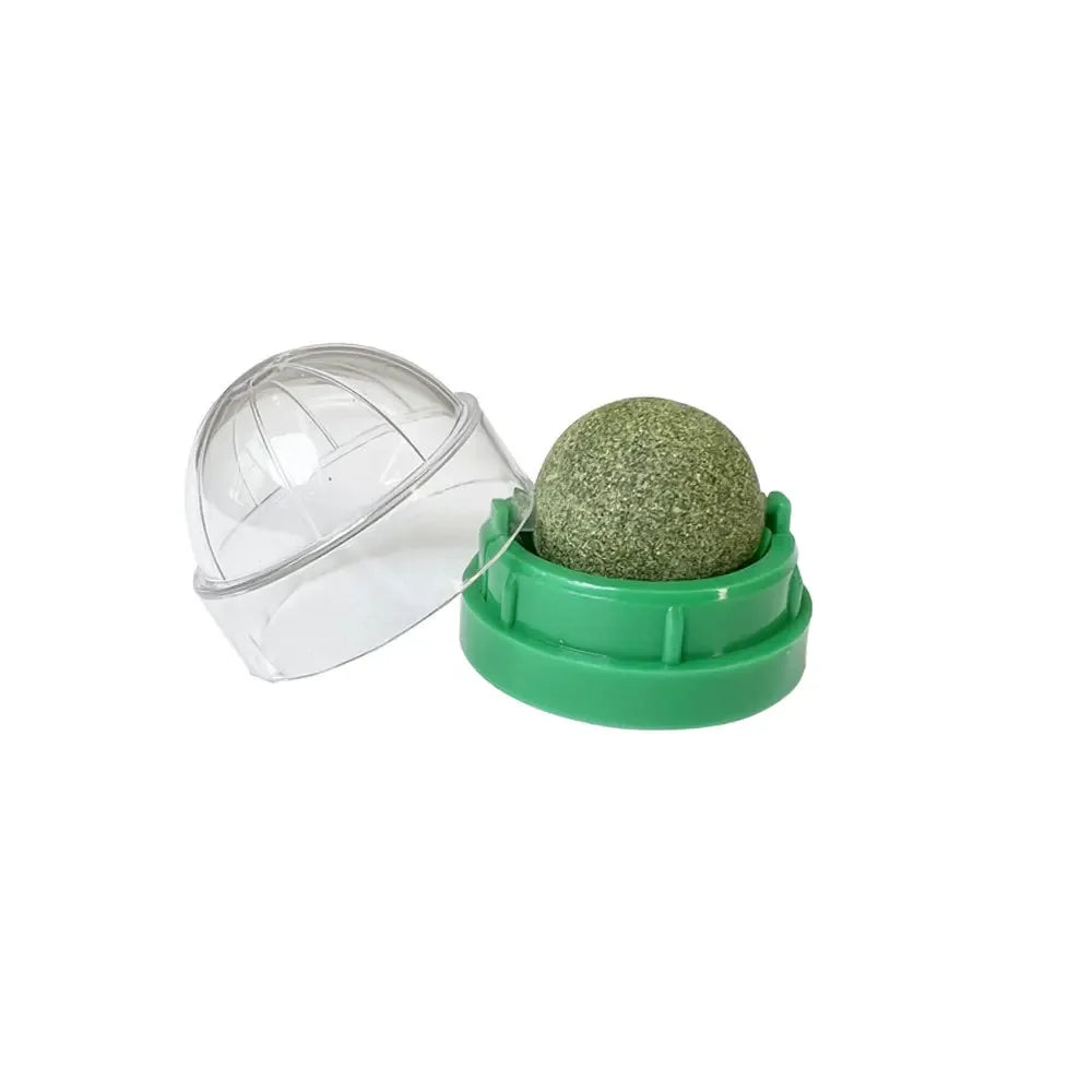 The Stick-On Natural Catnip Ball for Cats by KittyNook Cat Co. offers hairball control in a clear dome container.