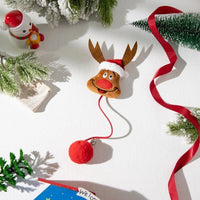 Thumbnail for A reindeer ornament with a Santa hat pairs perfectly with KittyNook Cat Co. Holiday Paws Christmas Elements Cat Toys.