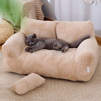 Thumbnail for A gray cat lounges on the KittyNook Cat Co. Modern Cat Couch for Happy Paws, elevating your cozy cat furniture setup.