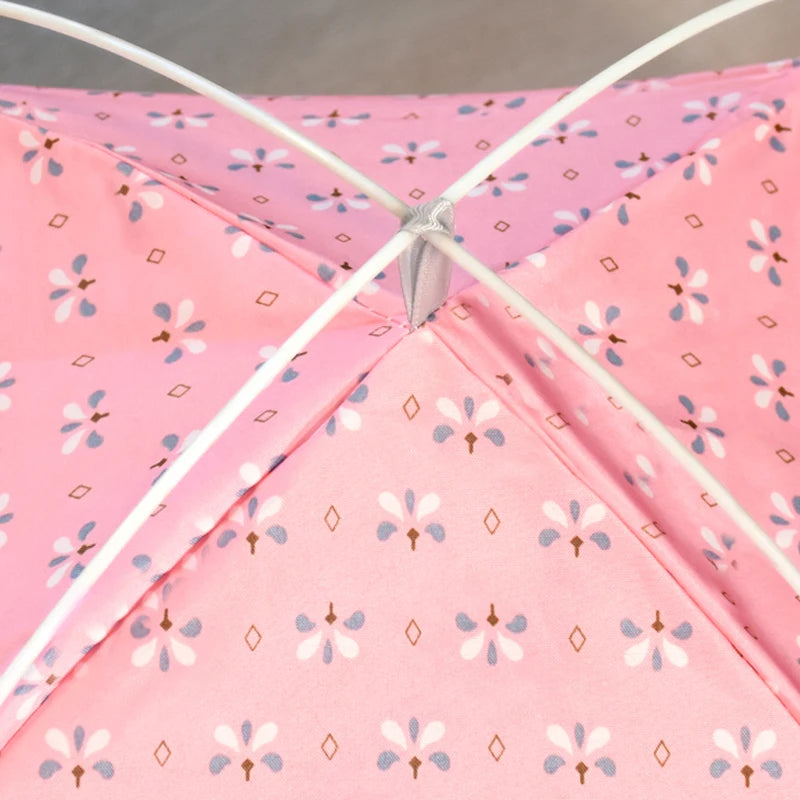 Close-up of pink floral and diamond fabric on the Serene Petal Semi-Enclosed Indoor Cat Tent by KittyNook Cat Co.