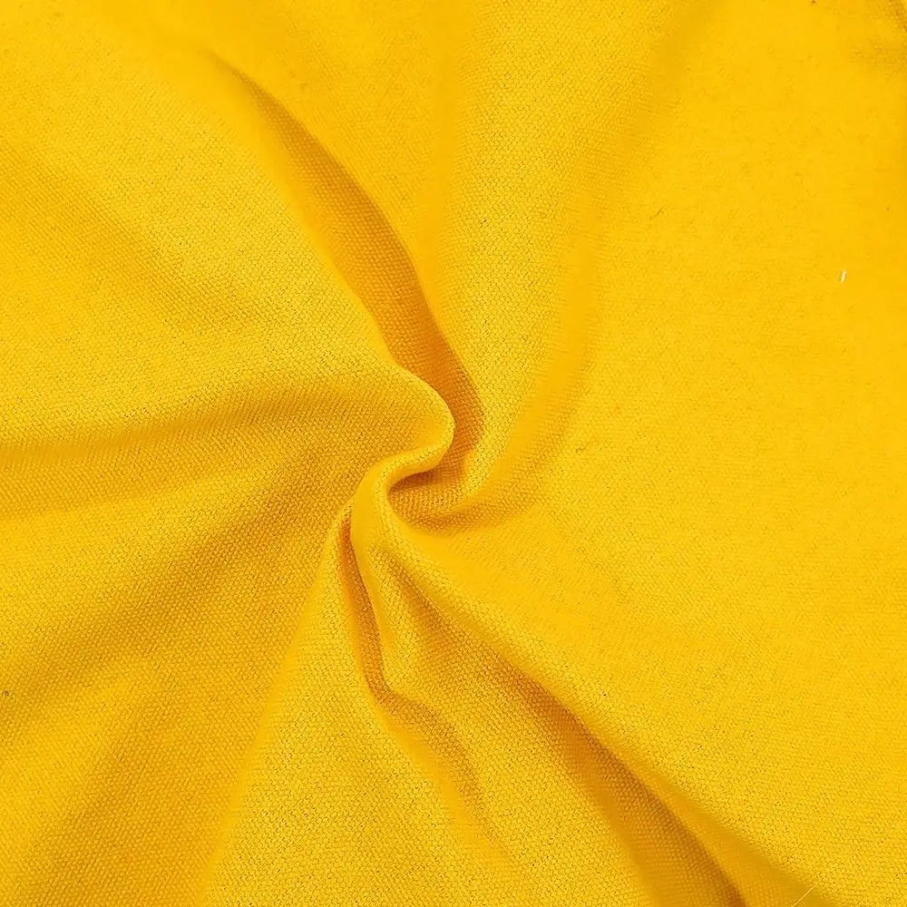 Yellow fabric swirled in soft folds, echoing the cozy style of the KittyNook Cat Co. Portable Crossbody Cat Carrier Bag.