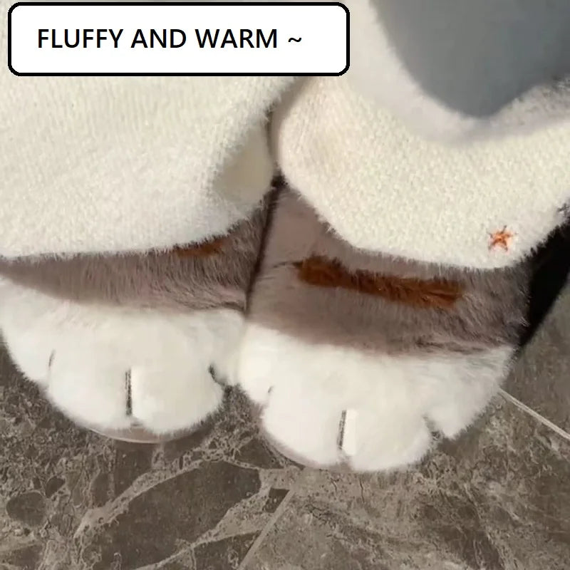 Adorable Kitty Claw Slippers by KittyNook Cat Co. with white pants, captioned "FLUFFY AND WARM ~" on tile floor.