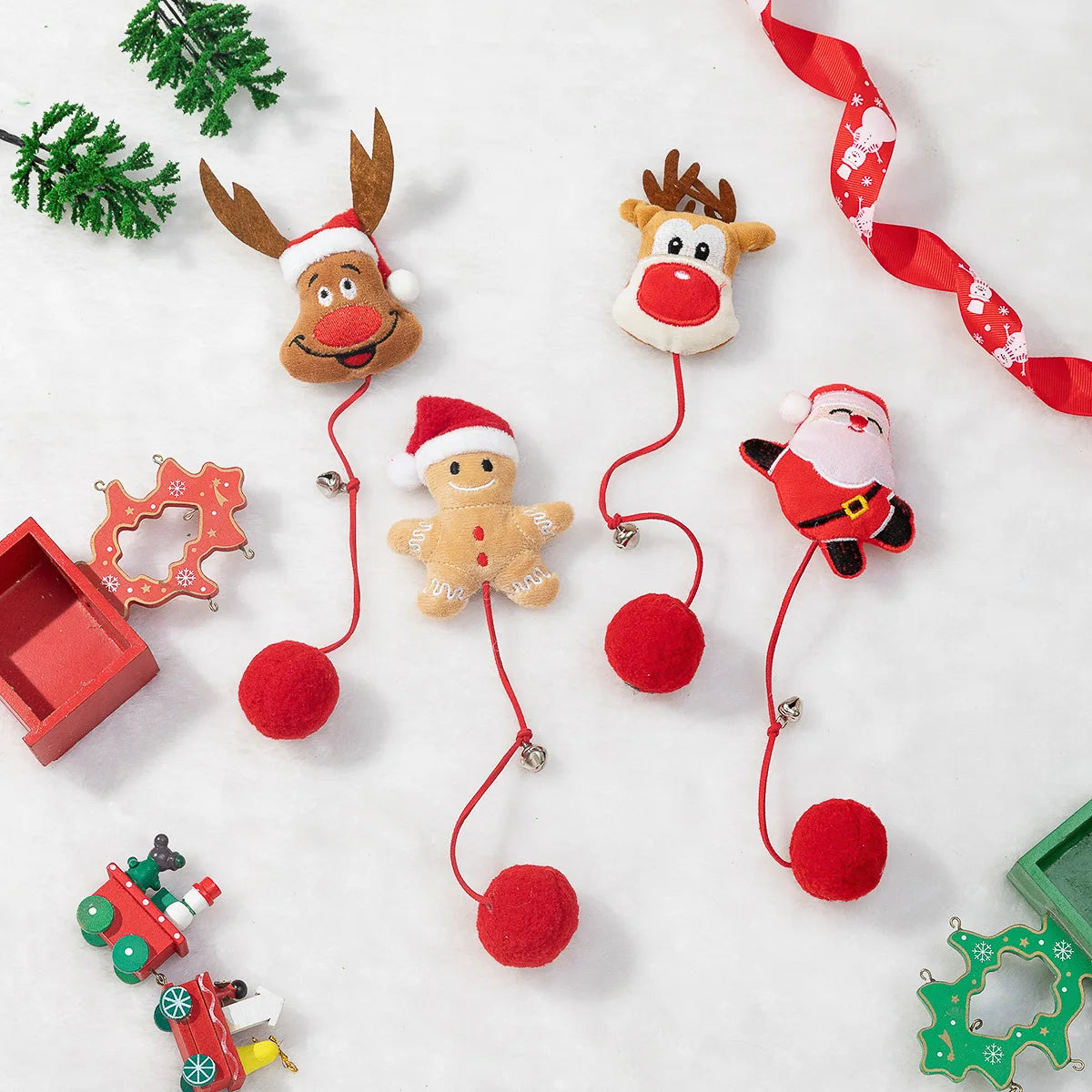 Holiday Paws Christmas Elements Cat Toys by KittyNook Cat Co. include a reindeer, gingerbread man & Santa on white.