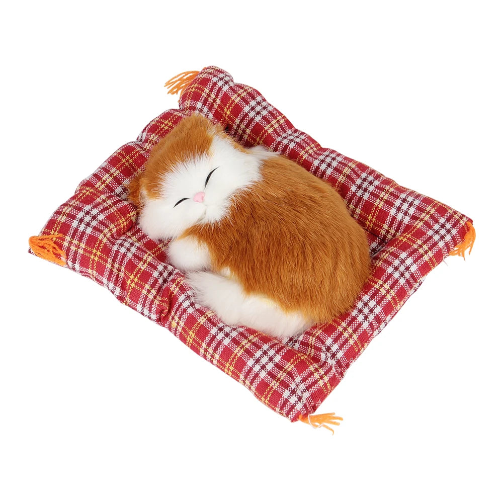 The KittyNook Cat Co. Sleepy Kitten Plush decorates your home or car with its red cushion and cute, curled-up charm.
