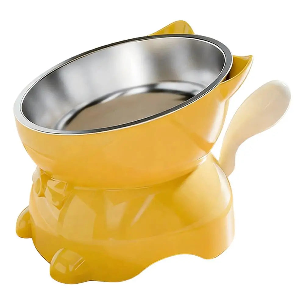 Yellow KittyNook Cat Co. Elevated Cat Food Bowl with Cute Ear Stand, featuring a removable stainless steel insert.