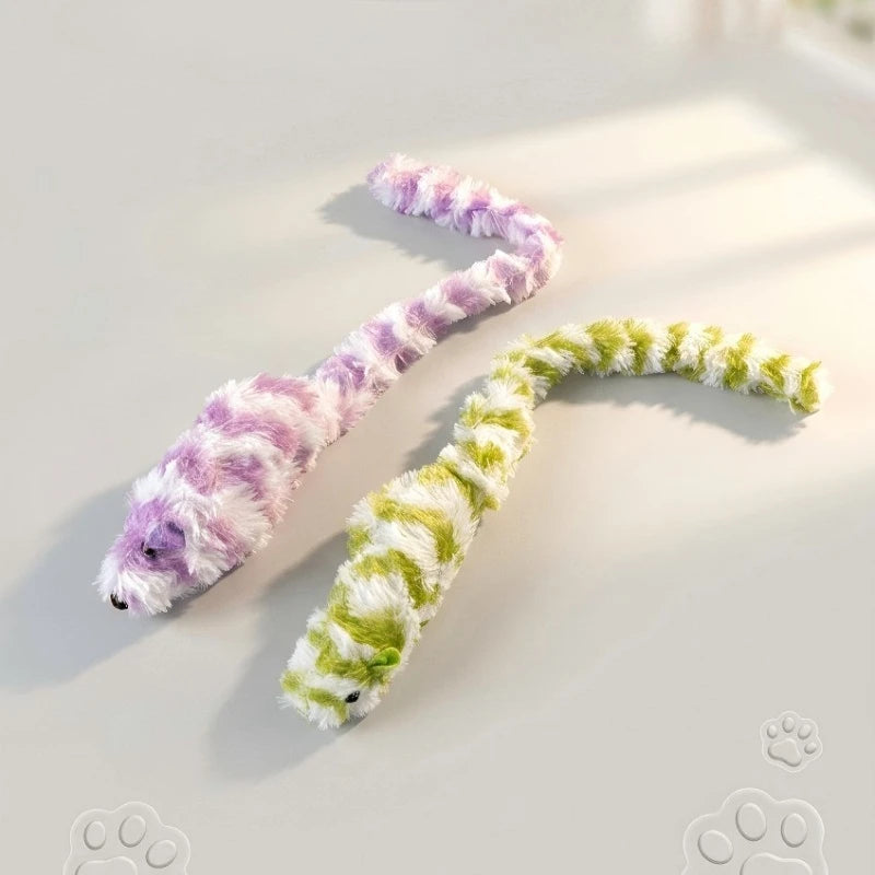 Two Interactive Mouse Chase Toys by KittyNook Cat Co. make perfect indoor cat toys, lying on a paw print surface.