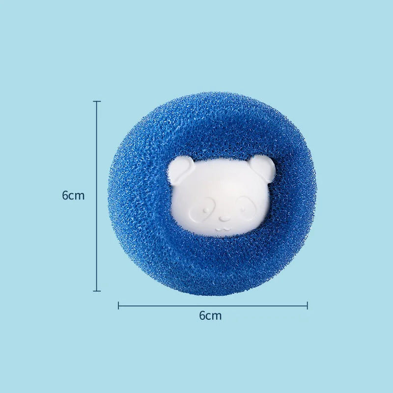 The Laundry Pet Hair Filter by KittyNook Cat Co. is a blue round 6cm sponge with a white bear face on a light blue background.