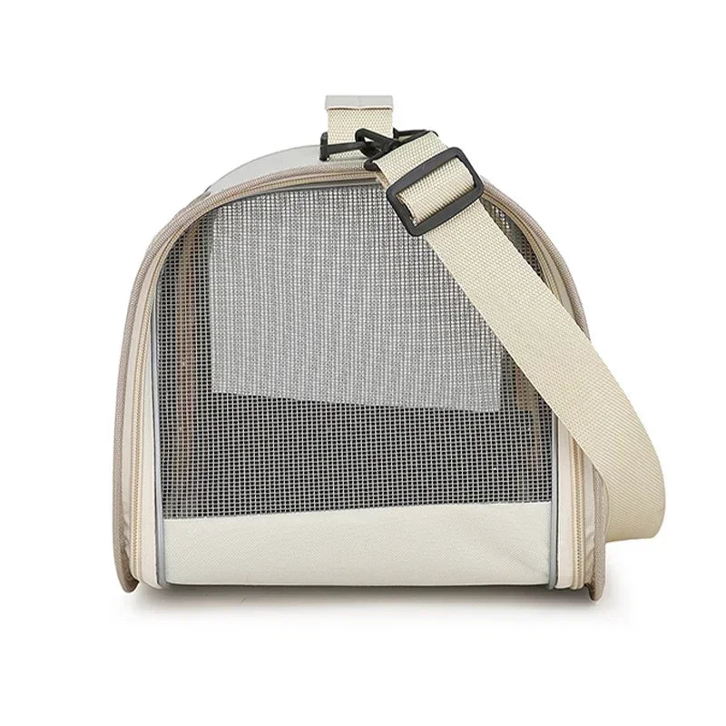 KittyNook Cat Co. Premium Foldable Small Cat Carrying Bag in beige/white, mesh front and adjustable strap, front view.