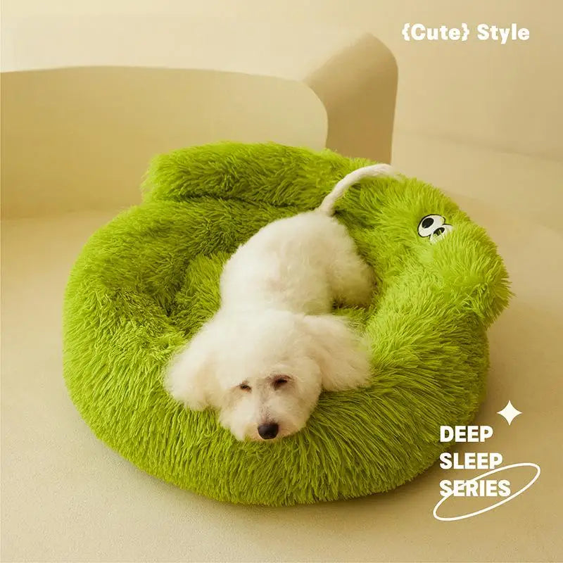 A small white poodle rests on the KittyNook Cat Co. Warm & Soft Cat Sleeping Pod in a cozy room.