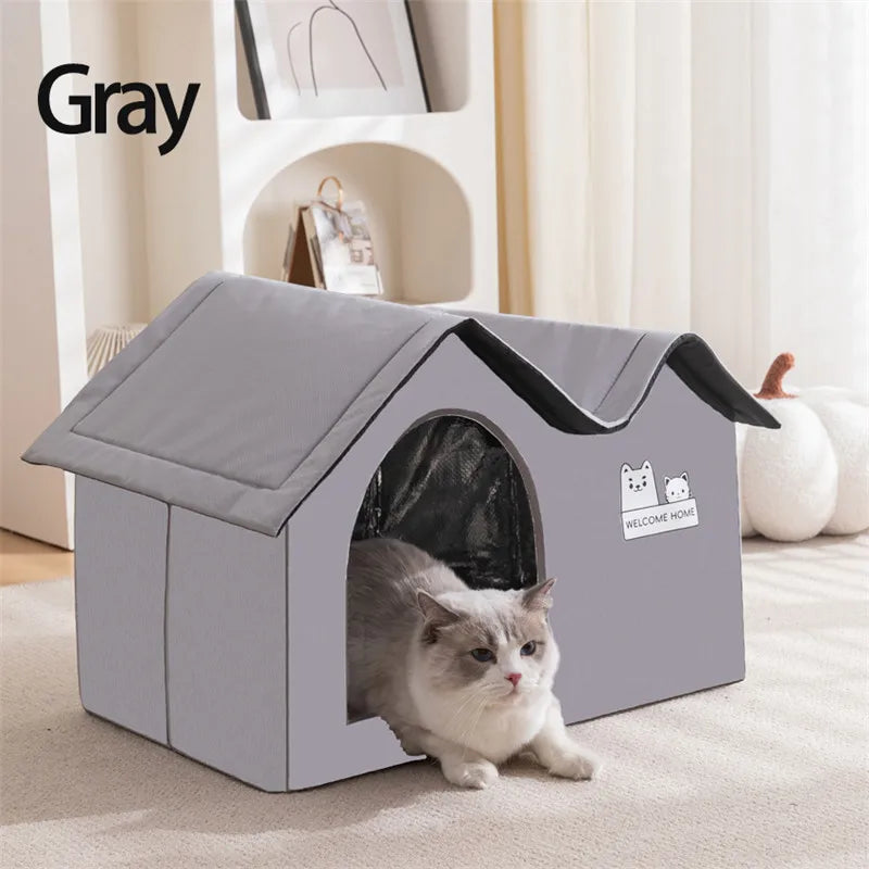 A gray cat lounges in the KittyNook Cat Co. Portable Pet Cooling House, enjoying indoor comfort on a light carpet.
