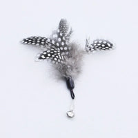 Thumbnail for KittyNook Cat Co.'s Eco-Friendly Wood & Feather Cat Teaser with bell clip, shown on a white background.