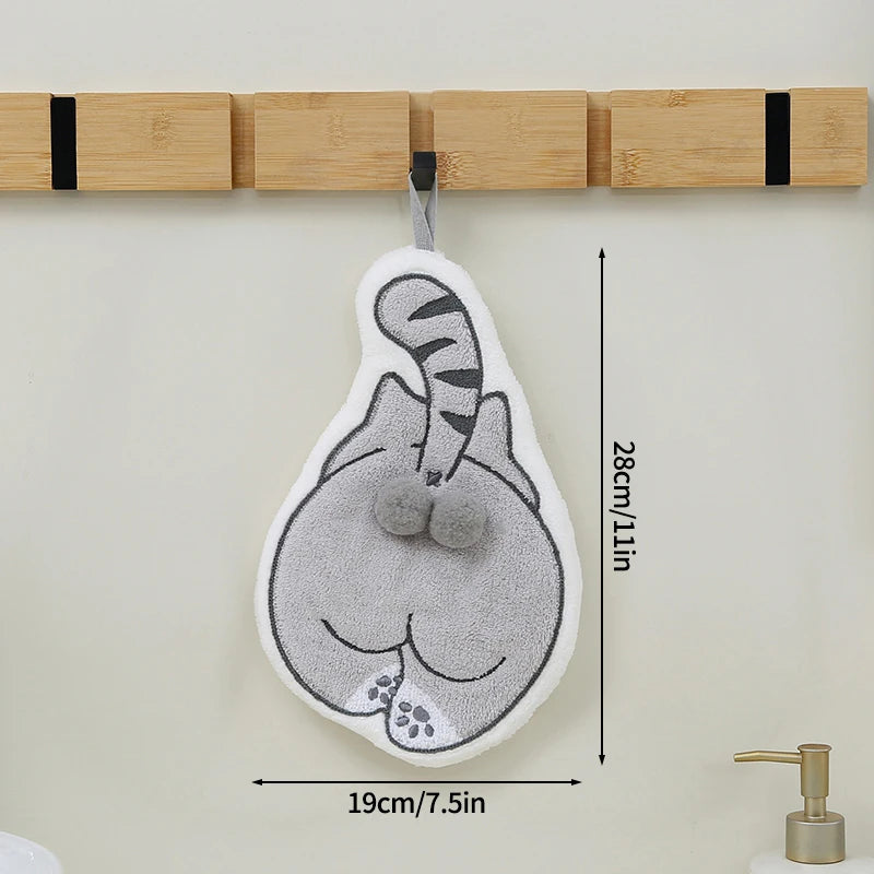 A Cartoon Cat Hanging Hand Towel shaped like a cat’s backside hanging from a wooden wall hook, with dimensions indicated.