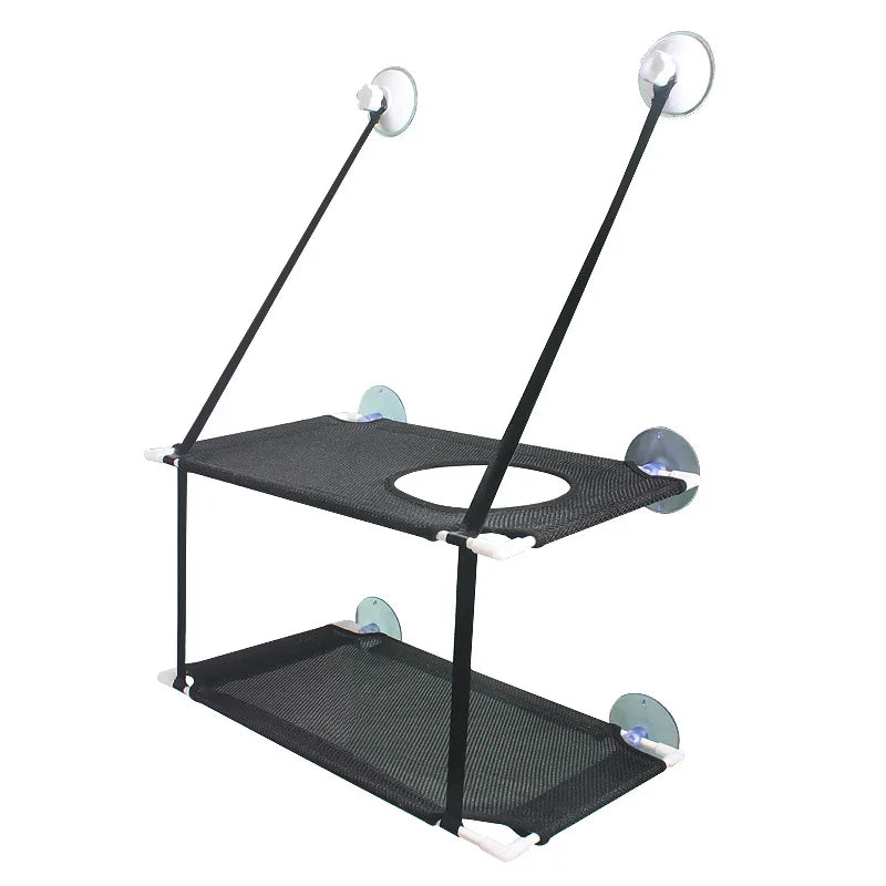 KittyNook Cat Co. Space-Saving Double Hanging Pet Bed mounts to windows with strong suction cups and straps.