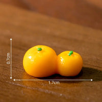 Thumbnail for The Creative Cat Doll Car Ornament by KittyNook Cat Co. is a cute, small orange cat accessory for your car.