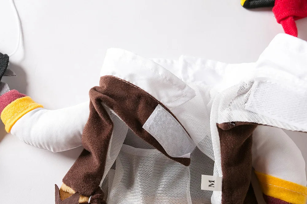 A close-up of the KittyNook Cat Co. Funny Pirate Cat Halloween Costume in size M, with mesh lining and Velcro patch.