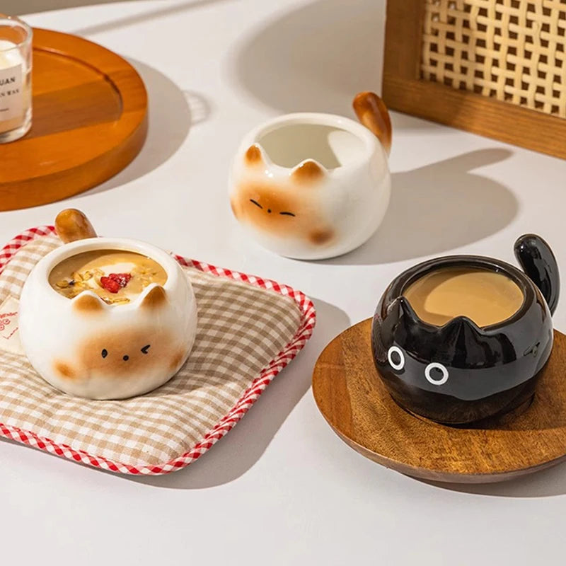 Three KittyNook Cat Co. Siamese Cat Coffee Cups filled with treats, perfect for cozy cat lover tables.