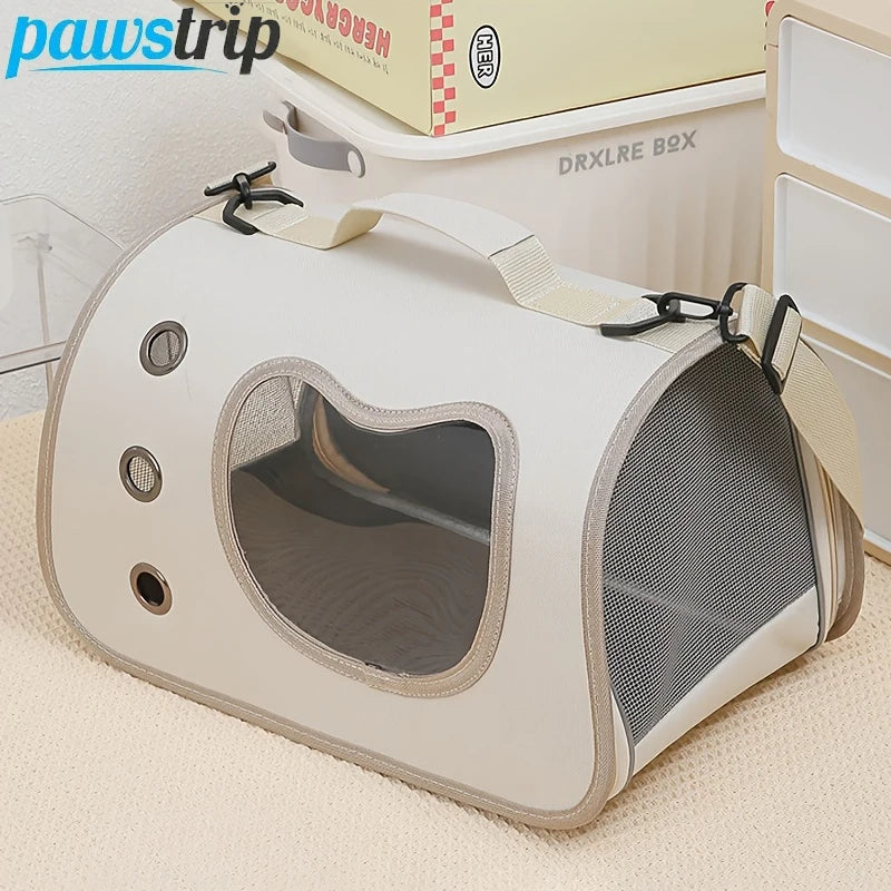 KittyNook Cat Co. Portable Pet Carrier Bag in beige with mesh sides, handle, and window, shown on a light carpet.