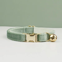 Thumbnail for KittyNook Cat Co. Velvet Cat Collar in light green with gold buckle and bell, offering luxurious softness and comfort.