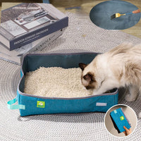 Thumbnail for A cat uses the KittyNook Cat Co. Portable Cat Litter Box on a rug, with books and close-ups of the mat and pocket visible.