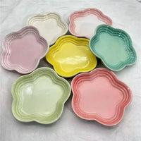 Thumbnail for The Extra Wide Raised Flower Cat Bowl by KittyNook Cat Co. features seven pastel flower-shaped ceramic dishes.