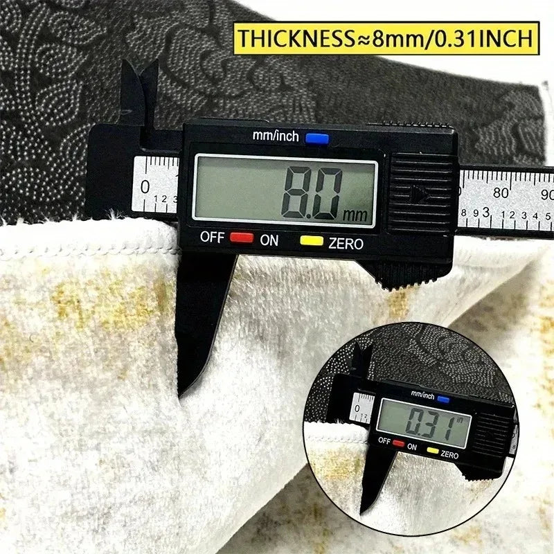 A digital caliper measures the 8.0 mm (0.31 in) thickness of a Cute Cat Shaped Rug – Soft Plush Cartoon Floor Mat.