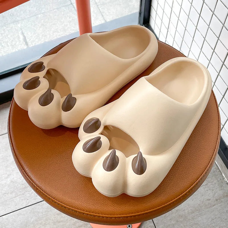 KittyNook Cat Co. Comfy Outdoor Cat Slippers feature a kawaii cat face and brown claws, offering cozy comfort.