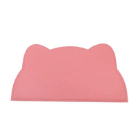 Thumbnail for KittyNook Cat Co.'s Silicone Pet Feeding Bowl is a pink, cat head-shaped mat with two ear-like bumps at the top.
