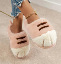 Thumbnail for Person wears Adorable Kitty Claw Slippers by KittyNook Cat Co. with jeans and a gold anklet on a carpeted floor.