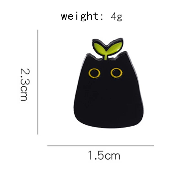 KittyNook Cat Co. Black Cat Enamel Brooch, 2.3 cm, yellow eyes & green sprout—perfect for cat lovers.
