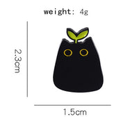 Thumbnail for KittyNook Cat Co. Black Cat Enamel Brooch, 2.3 cm, yellow eyes & green sprout—perfect for cat lovers.