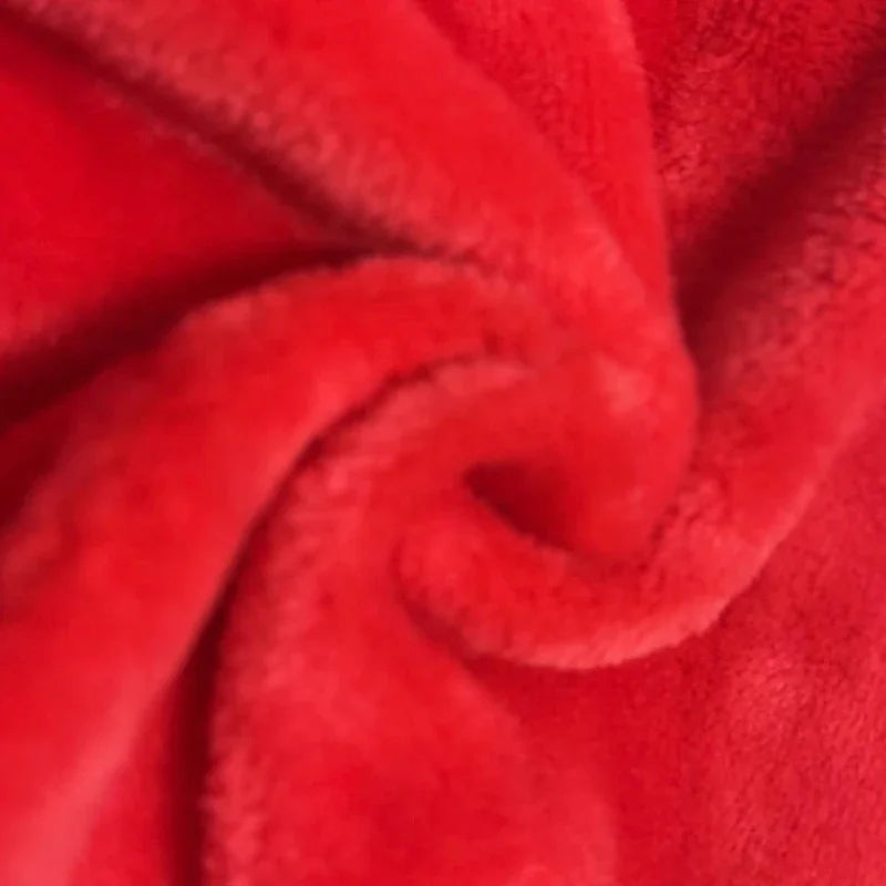 Close-up of soft, red fabric—ideal for KittyNook Cat Co. Warm Winter Hoodies for Hairless Kittens.