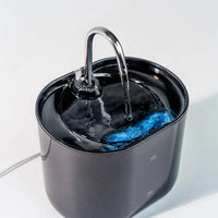 Thumbnail for KittyNook Cat Co. Cat Water Fountain Automatic Filter features a silver spout for better pet hydration, white background.