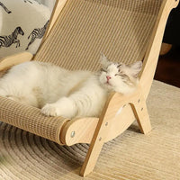Thumbnail for A fluffy white cat naps on the KittyNook Cat Co. Cat Sisal Wooden Chair, a modern lounge with a scratch-resistant seat.