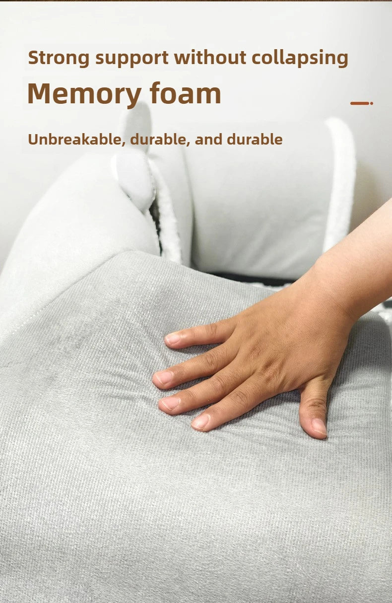 A hand presses on gray foam, like a cat settling into a KittyNook Cat Co. Interactive U-shaped Cat Tunnel for comfort.