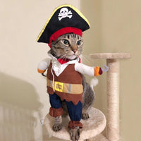 Thumbnail for A tabby cat wears the Halloween Funny Pirate Cat Costume by KittyNook Cat Co., standing on a cat tree.