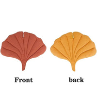 Thumbnail for Two terracotta and mustard yellow ginkgo leaf-shaped Leaf Pattern Cat Sleeping Mats, labeled “front” and “back”.