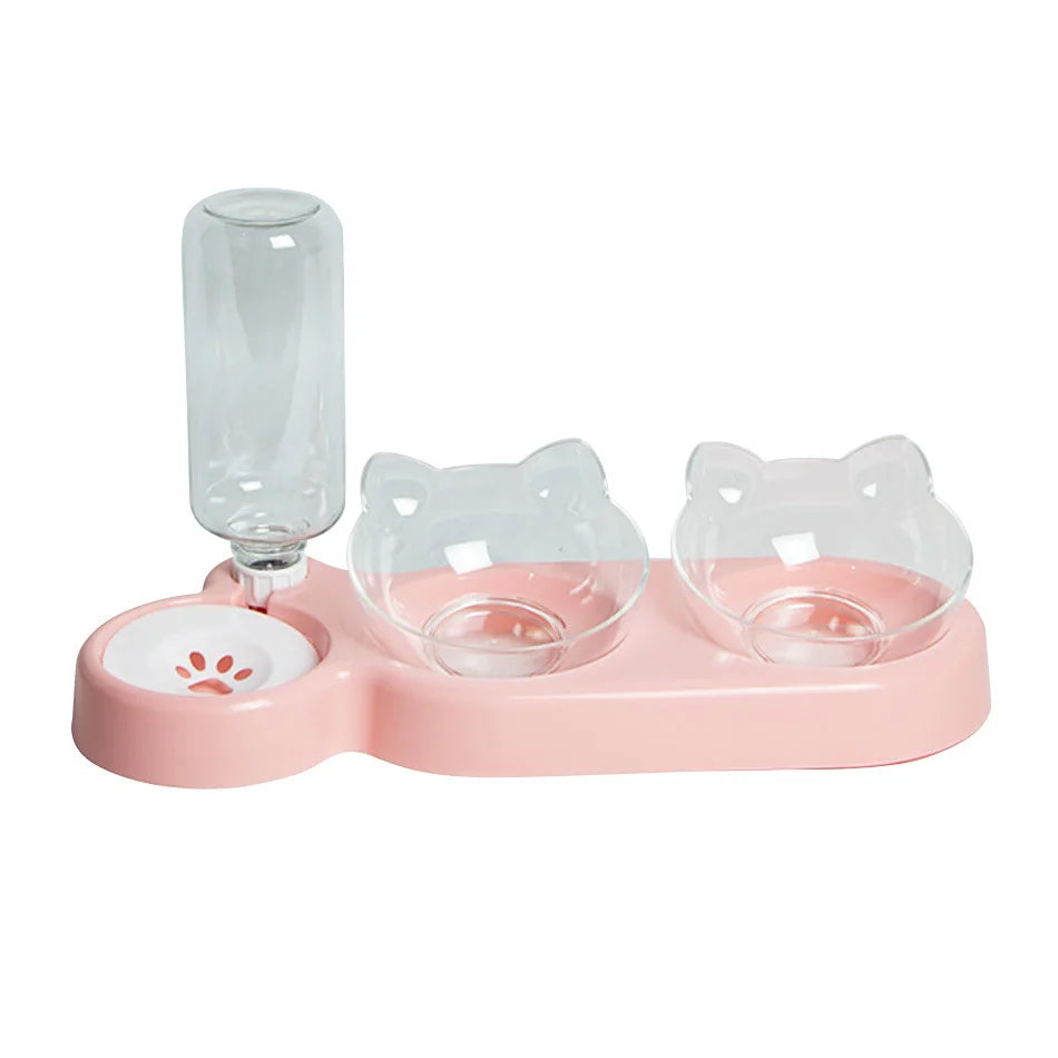 Pink pet feeder with two cat-shaped bowls and KittyNook Cat Co. Automatic Water Renewal Cat Bowl with filtration.