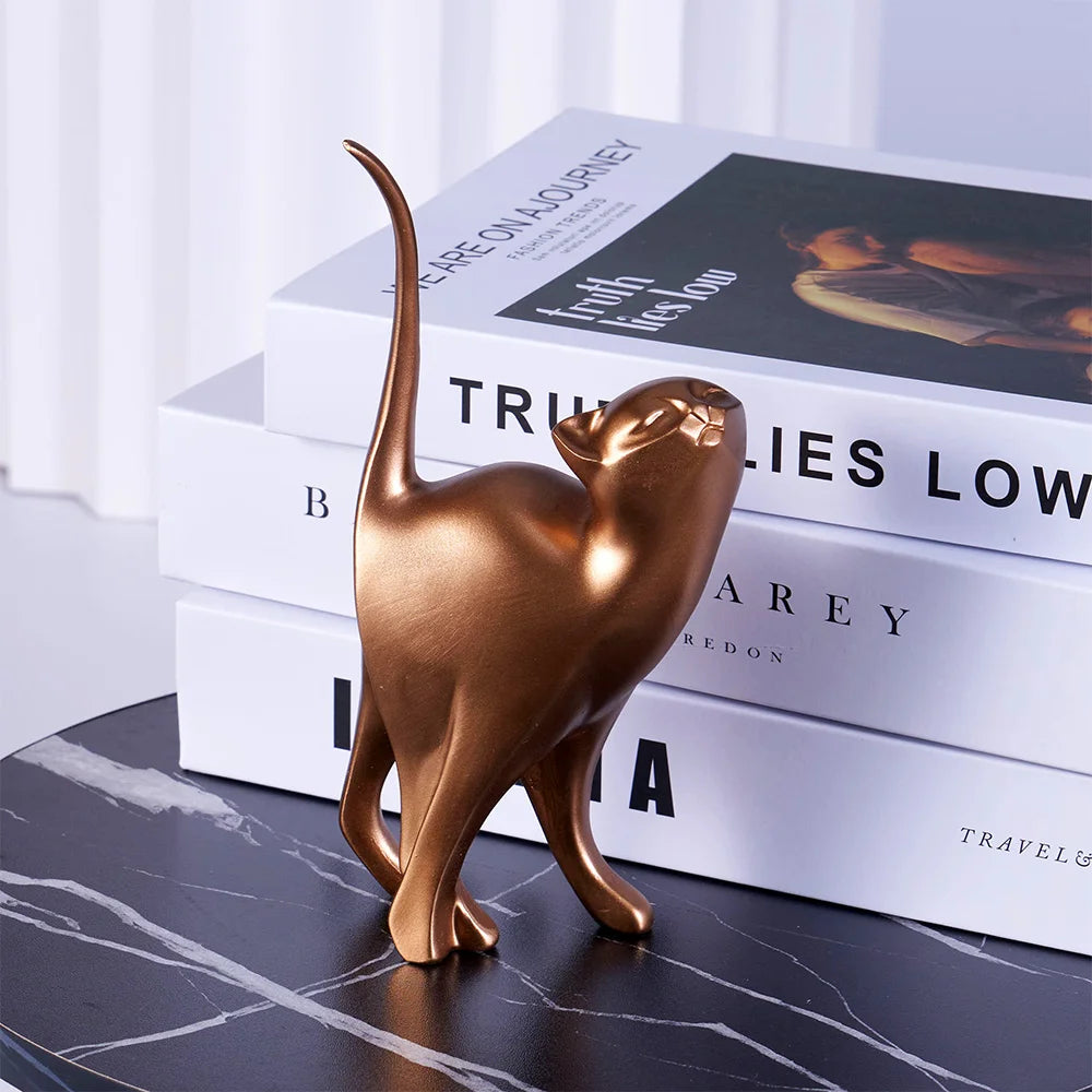 The KittyNook Cat Co. Golden Couples Cat Figurine is a thoughtful gift or a charming touch for couples' cat decor.