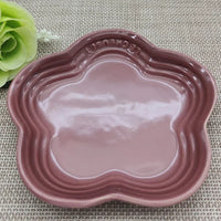 Thumbnail for The KittyNook Cat Co. Extra Wide Raised Flower Cat Bowl in pink is displayed on a woven surface with a green faux flower.